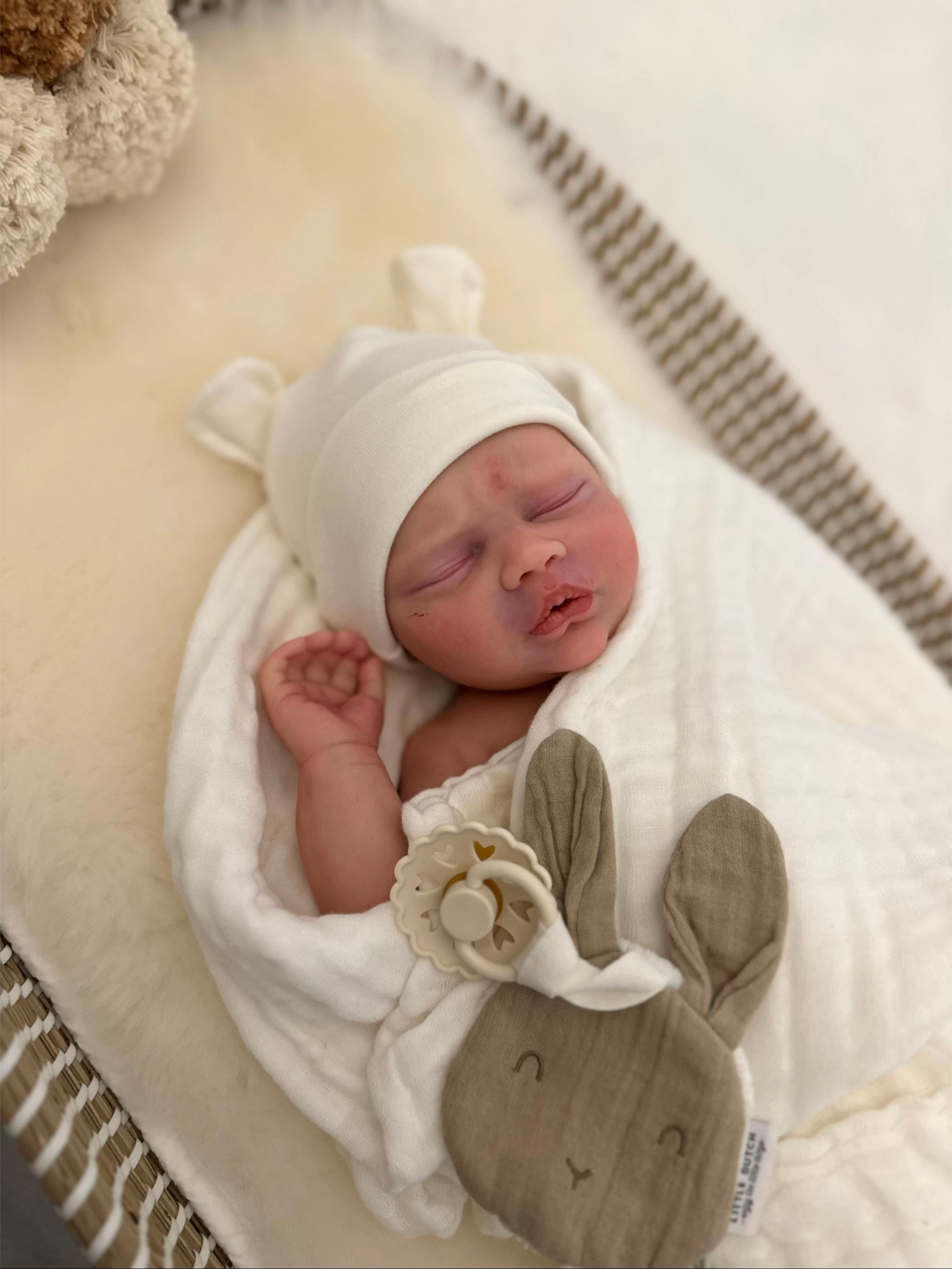 A premium solid silicone reborn baby safely packed for a luxury box opening experience.