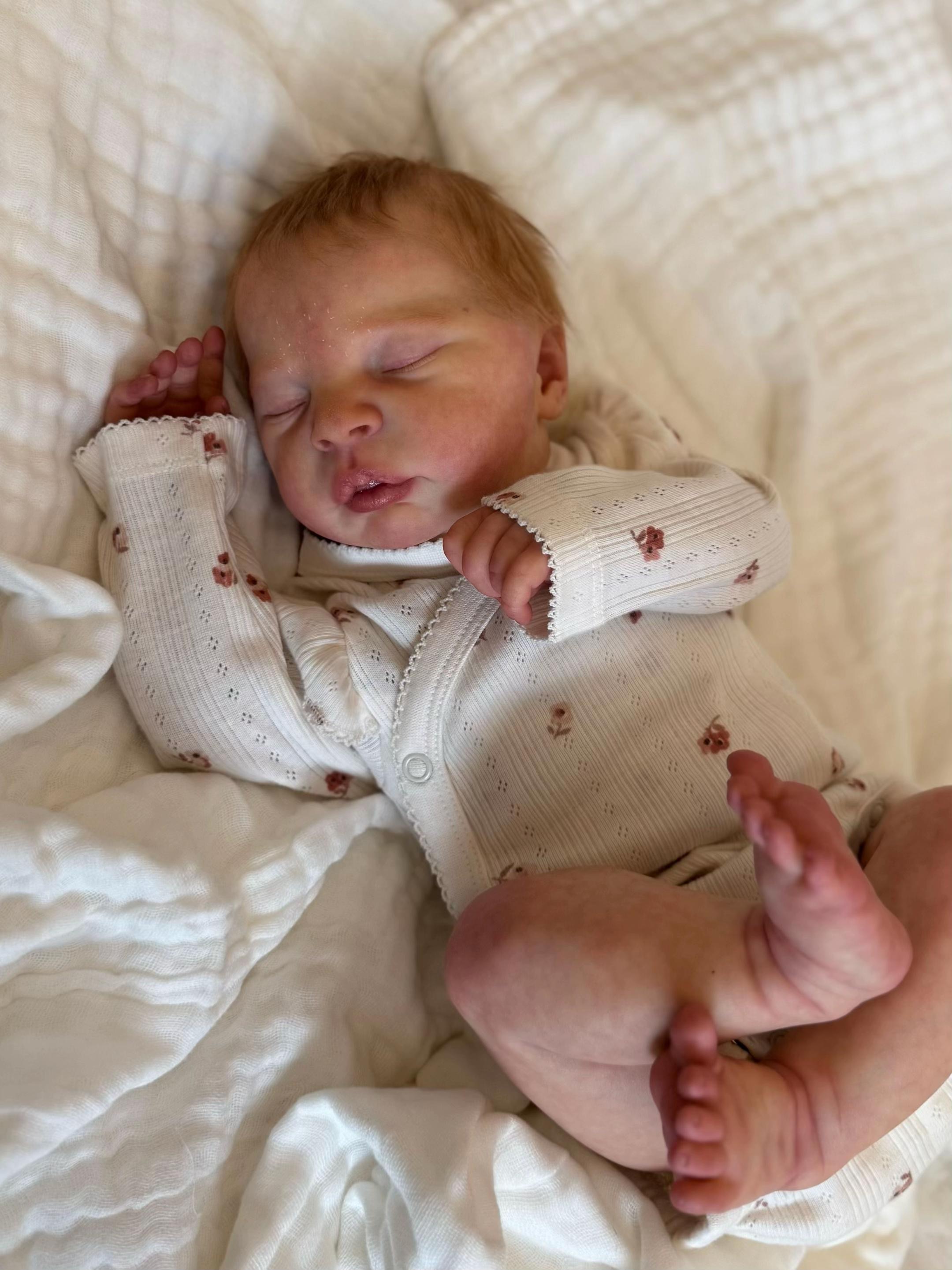 Baby Lucas – 18.3" Full Body Silicone Drink and Wet System Sleeping Realistic Newborn Baby Boy Doll (Hand Rooted Strawberry Blonde Hair)